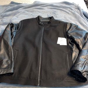 Mens Calvin Klein jacket brand new. Leather  sleeves